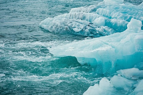 Blue icebergs floating in a cold, tranquil ocean scene, iceberg, glacier, snow, ice rock, ice