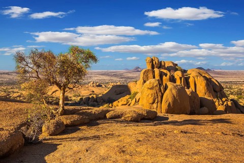 The granite outcrops in the Desert Namib. Stone of Spitzkoppe, Namibia. Play of light and shadow on