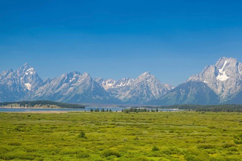 The amazing Teton mountains above Jackson Lake in Wyoming, USA, North America