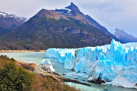 Los Glaciares National Park in Argentina. Sunny summer day. Colossal Perito Moreno glacier in Lake