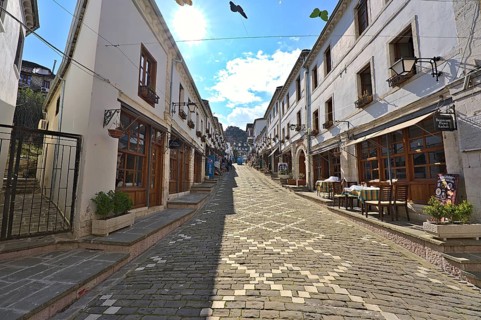 Historic city center of Gjirokastra with souvenir shops and restaurants, which has been modernises