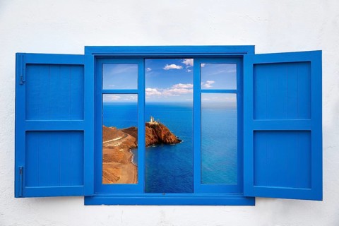 Almeria view from blue window of Cabo de Gata lighthouse photo mount