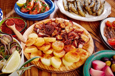 Tapas Pulpo a Feira with octopus potatoes gallega style and paprika recipe from Spain