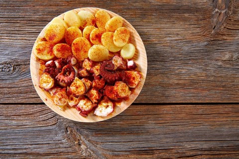 Tapas Pulpo a Feira with octopus potatoes gallega style and paprika recipe from Spain