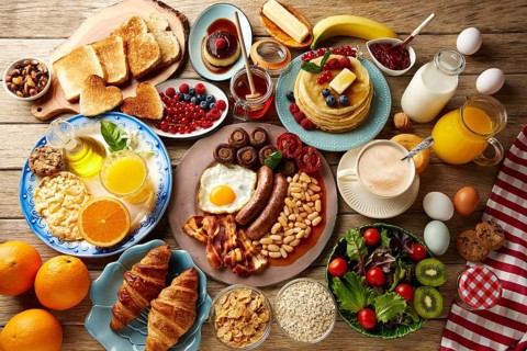 Breakfast buffet full continental and english coffee orange juice salad croissant fruit