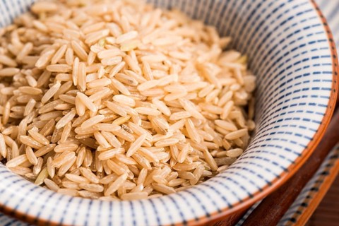 Raw brown rice in a bowl