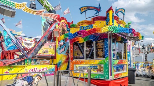 WIESBADEN, HESSE, Germany - 07-03-2023- Front of checkout cabin of a fairground ride with colourful