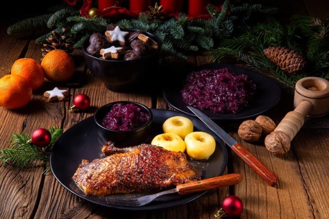 Classic and crispy roast duck with cabbage and dumplings