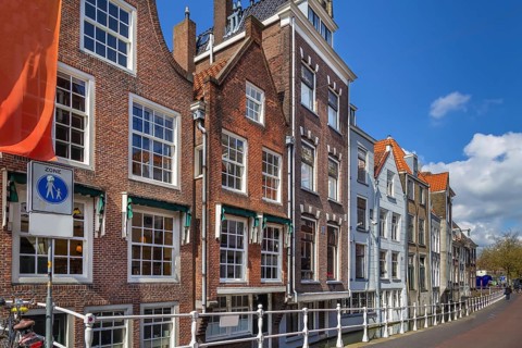 Canal embankment in Delft city center, Netherlands