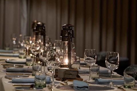 Set table with paraffin lamp, Qwabi Private Game Reserve, Biosphere Reserve, Limpopo, South Africa,