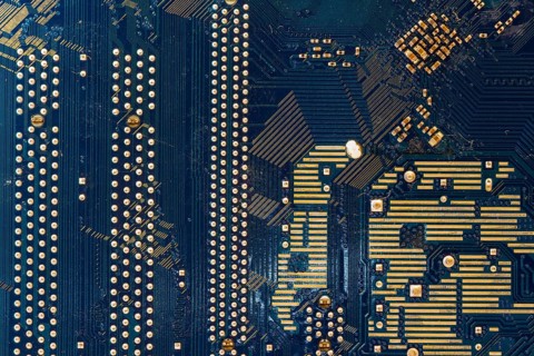 Detail of the back of a motherboard. Circuits and welds