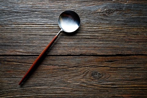 Kitchen tools spatule kitchenware on wooden background