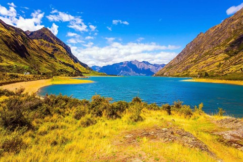 Great trip to a fabulous country. Huge Hawea Lake with turquoise smooth water. The steep slopes of