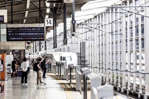 KYOTO, JAPAN - SEPTEMBER 24 2024: A Shinkansen high-speed bullet train arriving at Kyoto Station in