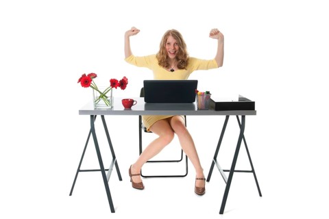 Young woman is happy with the message at the laptop