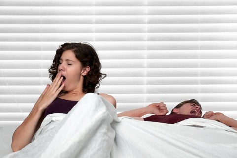 Young married couple waking upin the morning