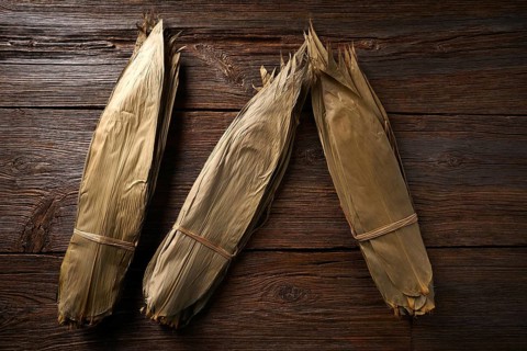 Dried Bamboo leaves in brown for Zongzi asian recipe preparation