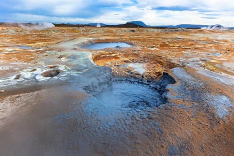Hot Mud Pots in the Geothermal Area Hverir, Iceland. Horizontal shot