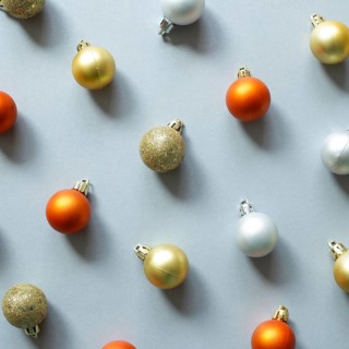Christmas ornament. Colorful baubles on gray background. flat lay, top view