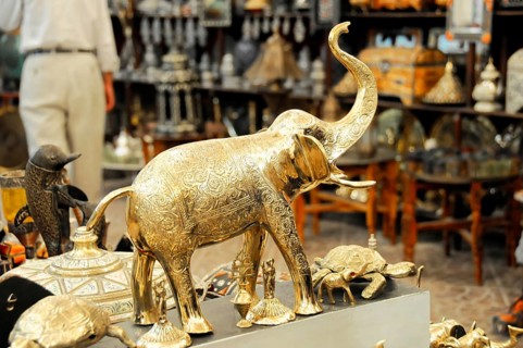 Brass figures at a market, including an elephant and other animal sculptures, Fez, northern