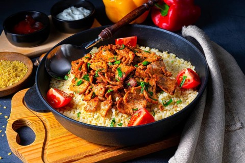 Rustic Wulgur pans with gratinated gyros and yoghurt