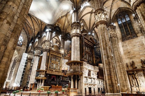 Altar with frescoes by the Duomo. Italy, Milan.