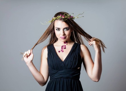 Girl with fashion make up and dry roses petals natural tattoo
