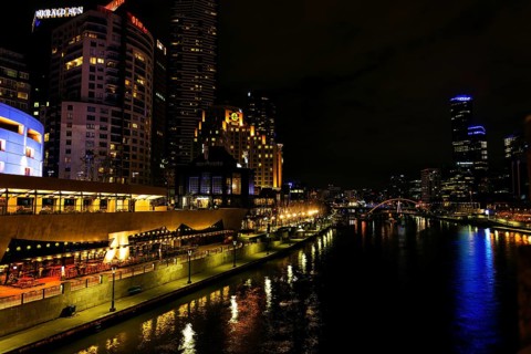 Central melbourne city river side modern urban skyline at night in australia