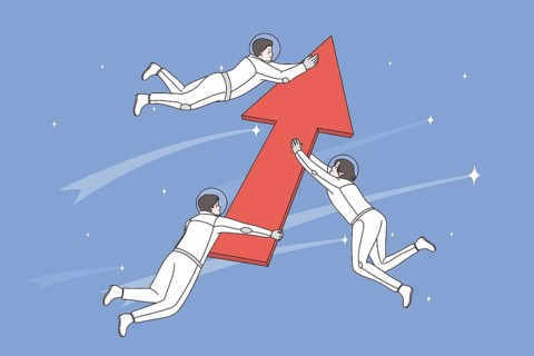Development and exploring space concept. Group of positive men astronauts cosmonauts holding huge