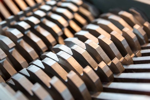 Metal blades of a chopper machine. New sharp blades made of hardened steel. Ready to cut anything.