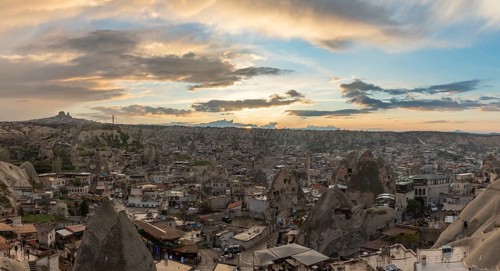 A picture of the town of Goreme, in Cappadocia, at sunset