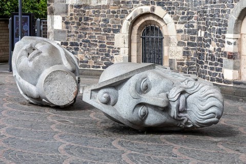 Heads of Bonn's patron saints Cassius and Florentus in front of Bonn Minster - Bonn, North