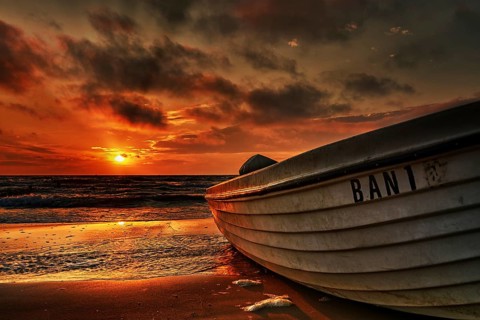 Fishing boat at sunrise in the seaside resort of Bansin on the island of Usedom