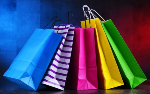 Composition with colorful paper shopping bags