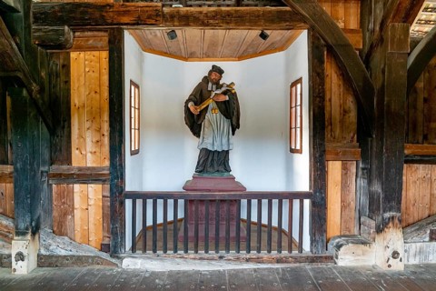 Germany - 4 July 2020: statue in the interior of the historic covered wooden bridge in Bad