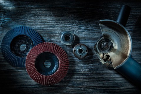 Radial grinding discs for angle grinders on an old wooden board