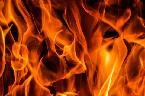 Flames of fire on a black background. The mystery of fire