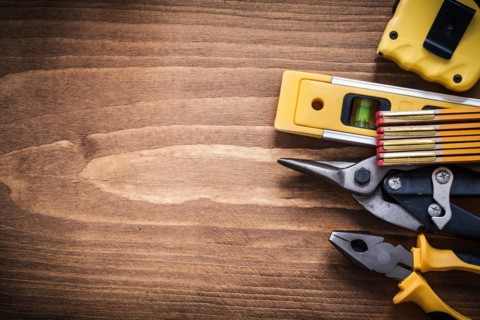 Pliers tape-measure steel cutter construction level wooden meter copy space