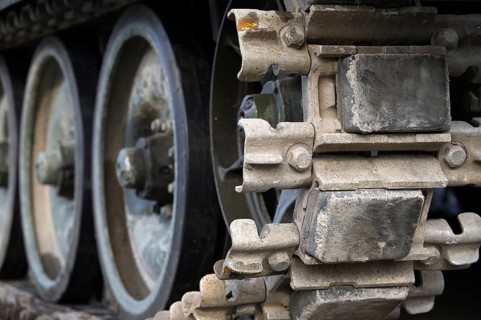 Military tank continuous track in close up view low angle view