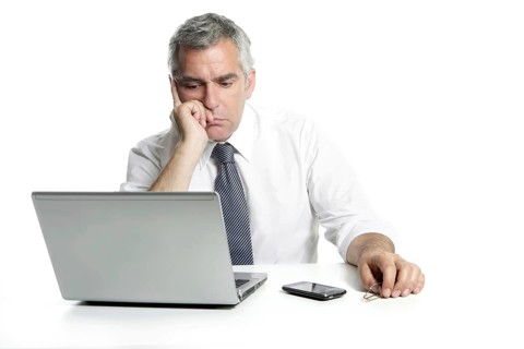 Businessman sad senior thinking laptop computer white background gray hair