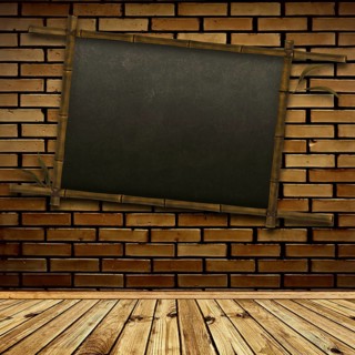 Old bamboo blackboard on the brick wall