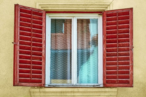 Window with Opened Wooden Shutters in Sigisoara, Romania Sigisoara, Romania, Europe