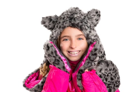 Blond kid girl with winter gray feline fur scarf hat in white background