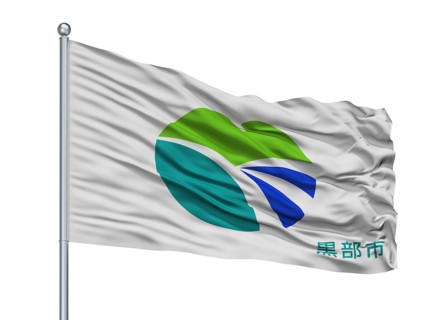 Kurobe City Flag On Flagpole, Country Japan, Toyama Prefecture, Isolated On White Background