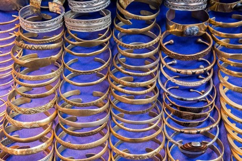 Golden bracelets in a shop in a souk in Marrakech. Morocco