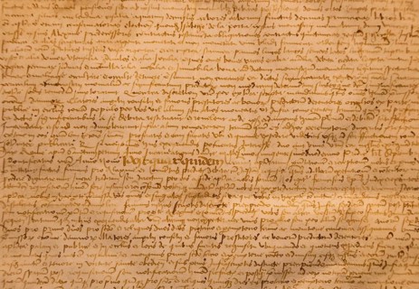 Aged handwritten manuscript text. Calligraphy on old paper, vintage background