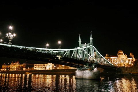 Night illumination of the Freedom Bridge in Budapest.