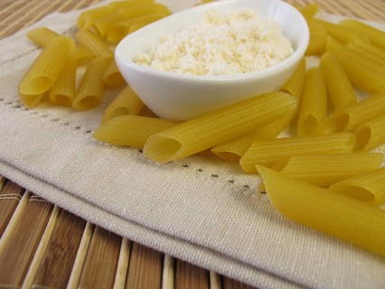 Gluten-free penne pasta and grated cheese