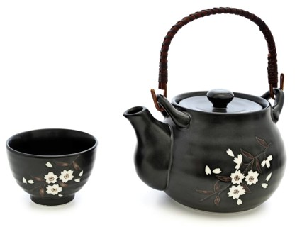 China tableware for chinese tea ceremony: teapot and bowl over white background