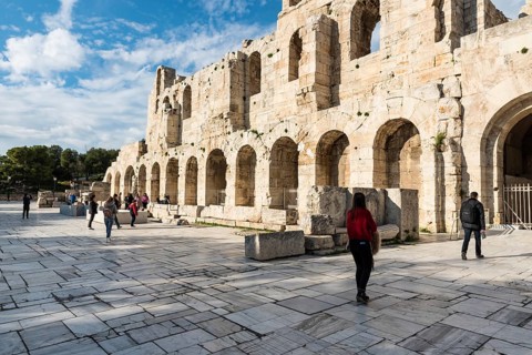 Athens Old Town, Attica, Greece, 12 28 2019 Tourists walking around the theater at the Acropolis,